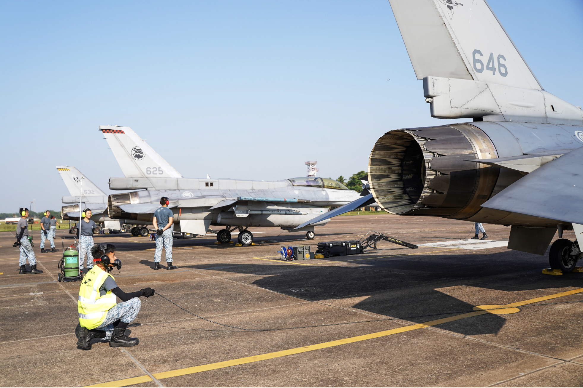 RSAF personnel preparing the F-16C/D for launch at the Kalaikunda Air Force Station as part of JMT 19. Photo courtesy: Mindef