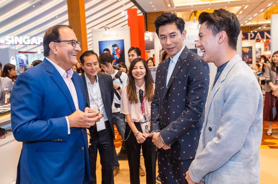 Minister Iswaran speaking to local actors Desmond Tan and Edwin Goh at ATF. Photo courtesy: Mr S Iswaran's FB page