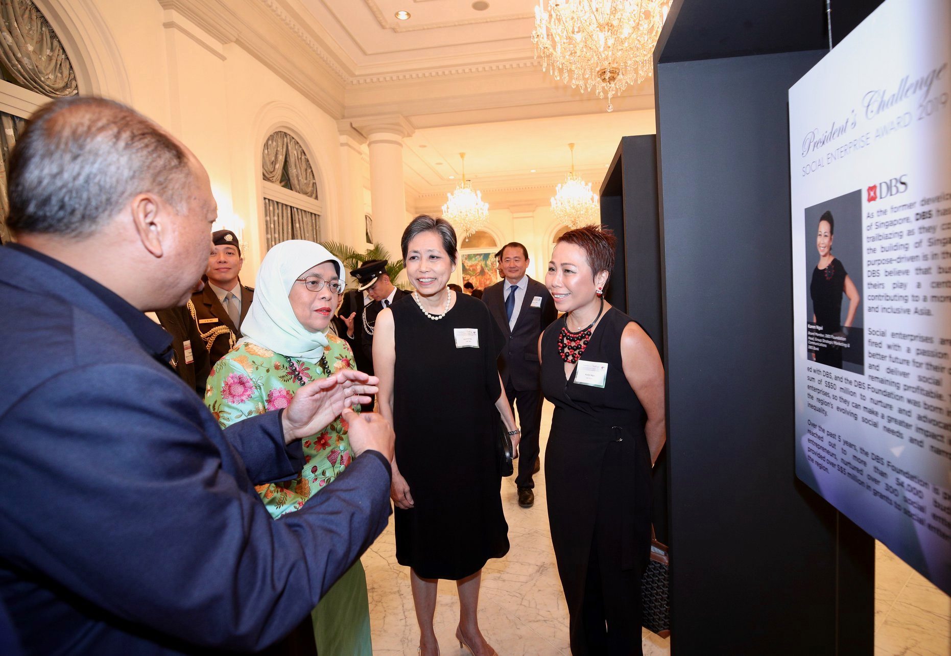 DBS shares with President Halimah how they had helped to nurture over 300 social enterprises through awareness building activities, funding support, capacity building initiatives, and access to lower banking fees. Photo courtesy: MCI, Chwee