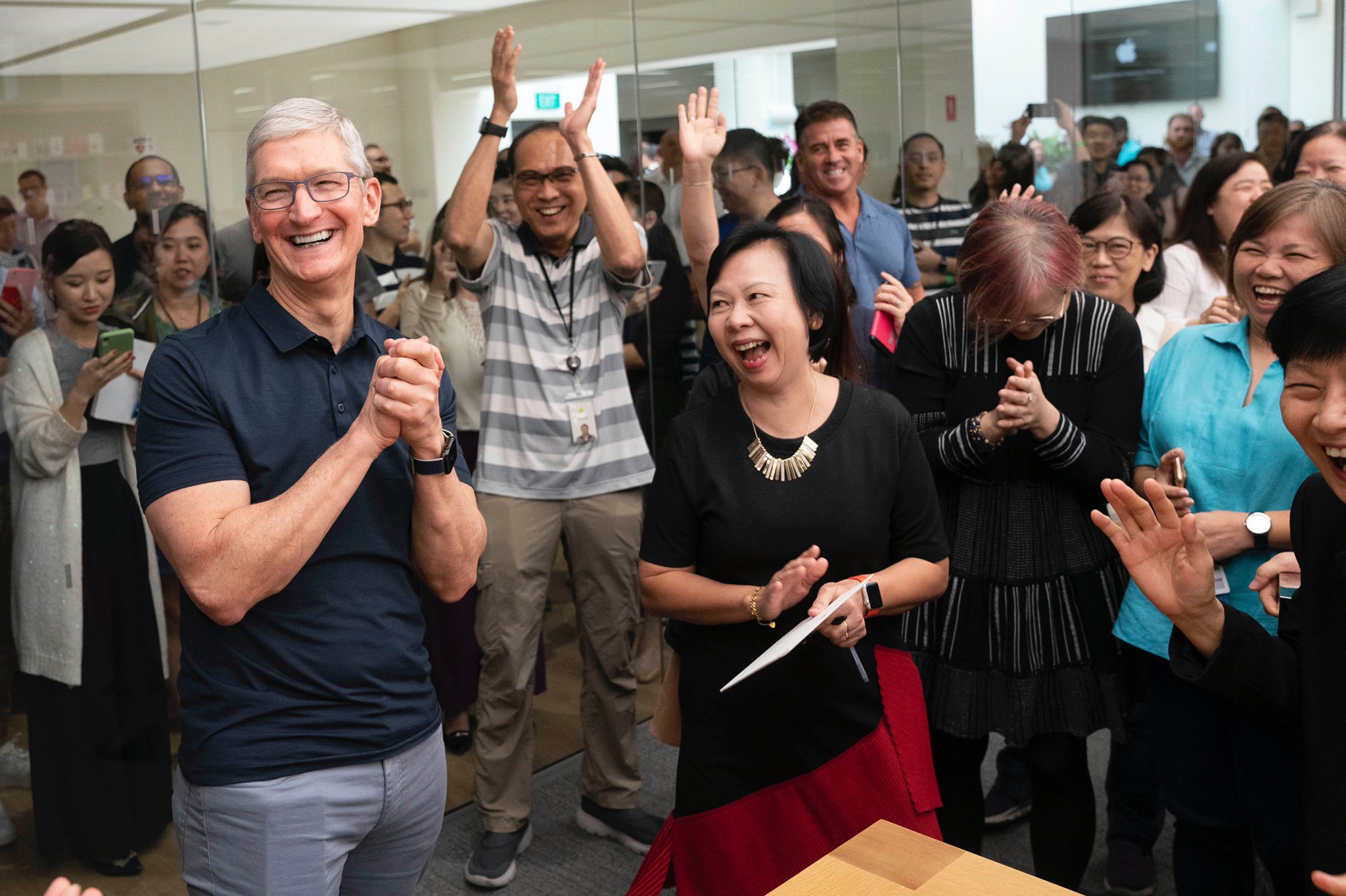 Cook with Apple's Singapore employees. Photo courtesy: Tim Cook, Twitter