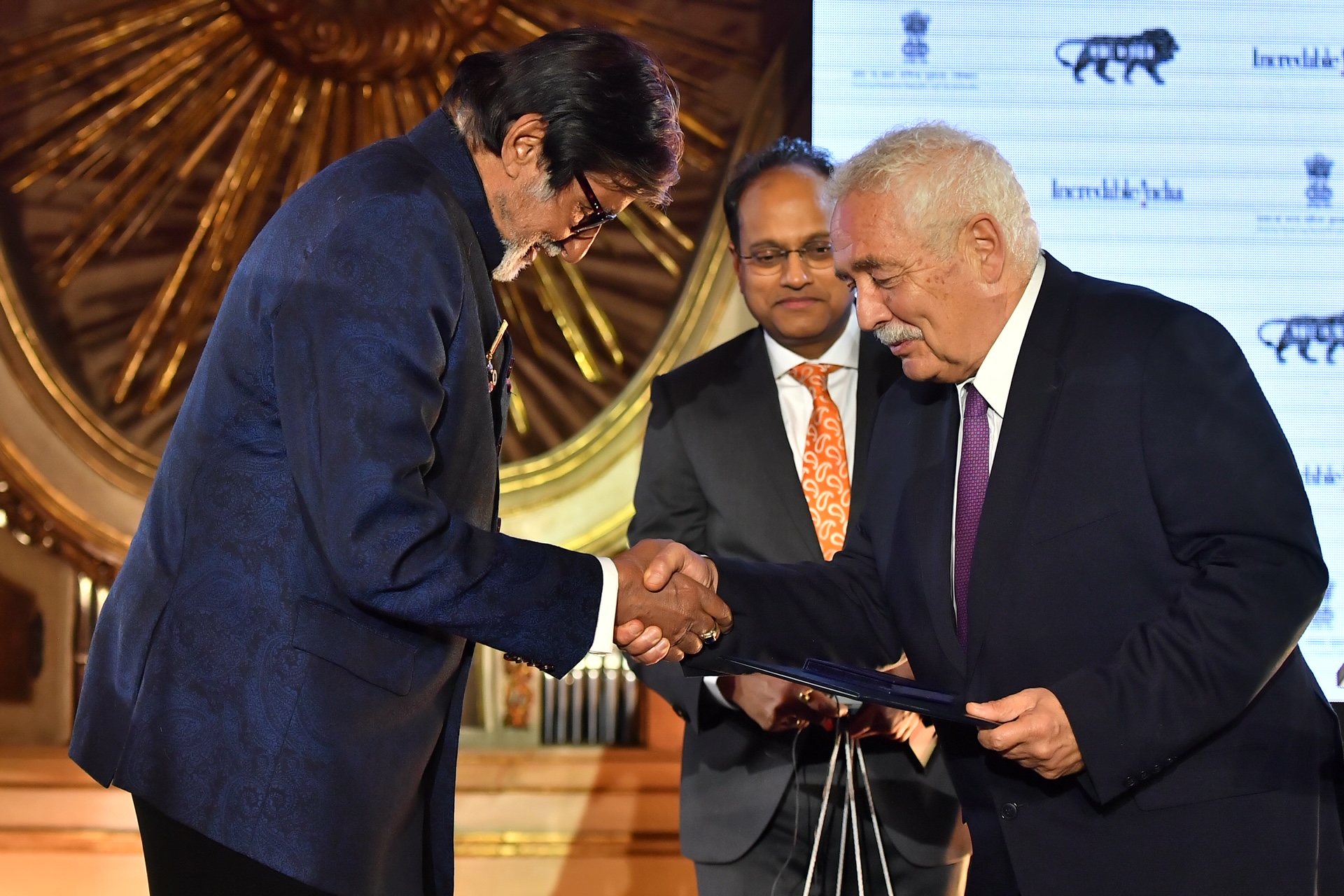 Receiving the Medal of the 