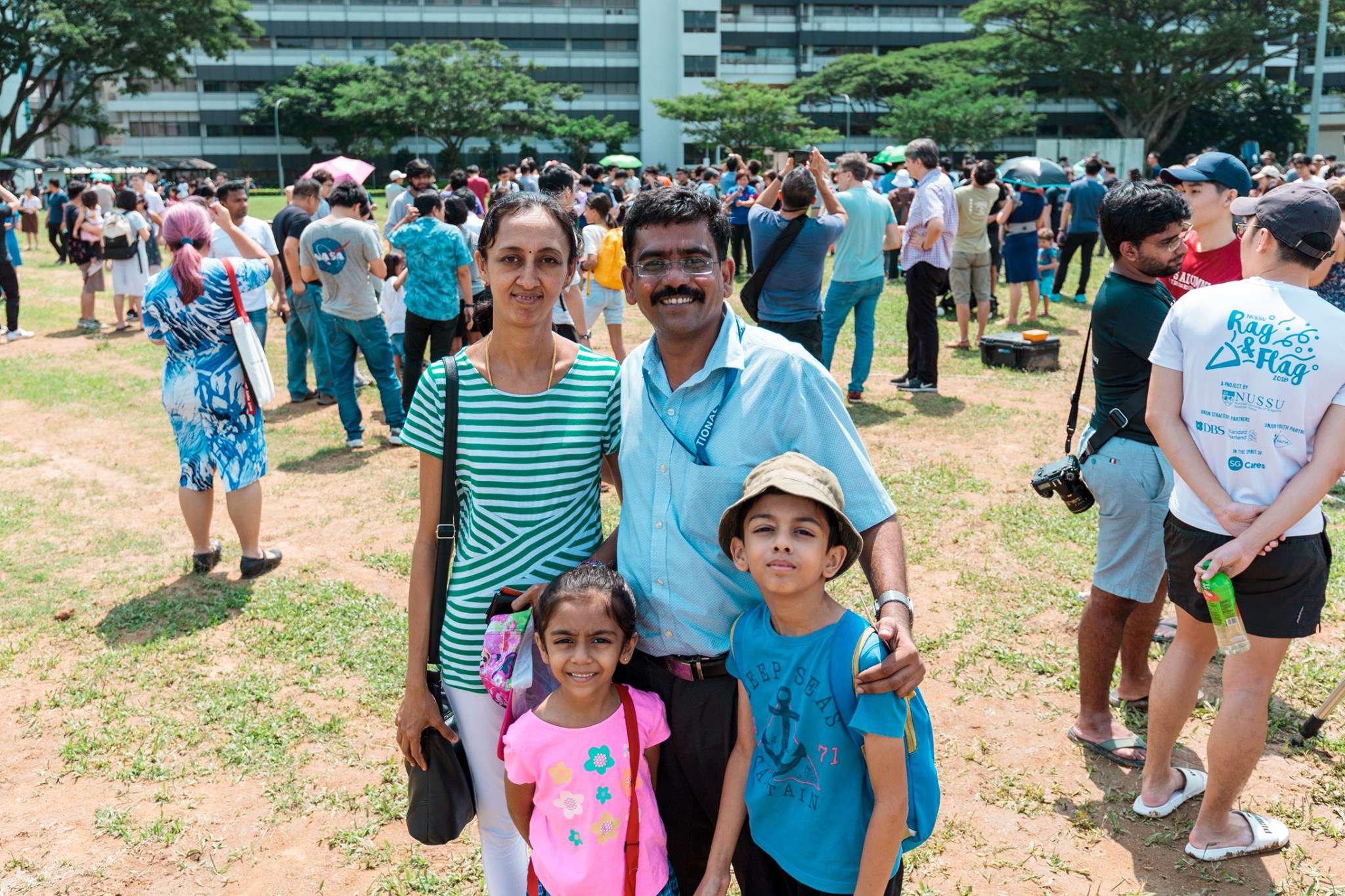 NUS Yong Loo Lin School of Medicine Asst Prof Karthik Mallilankarama and his family went down to the NUS Field to witness the eclipse. Photo courtesy: NUS