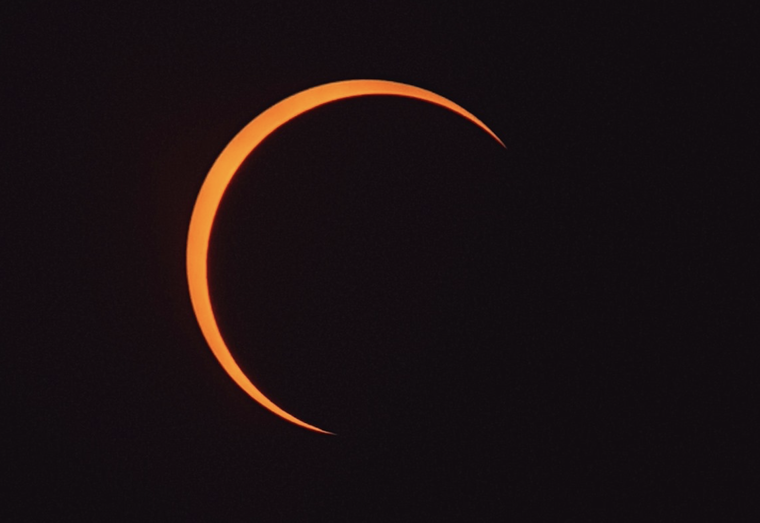 NUS Engineering undergrad and NUS Astronomical Society member Julian Cheung captured this image of the eclipse nearing its climax. Photo courtesy: Julian Cheung