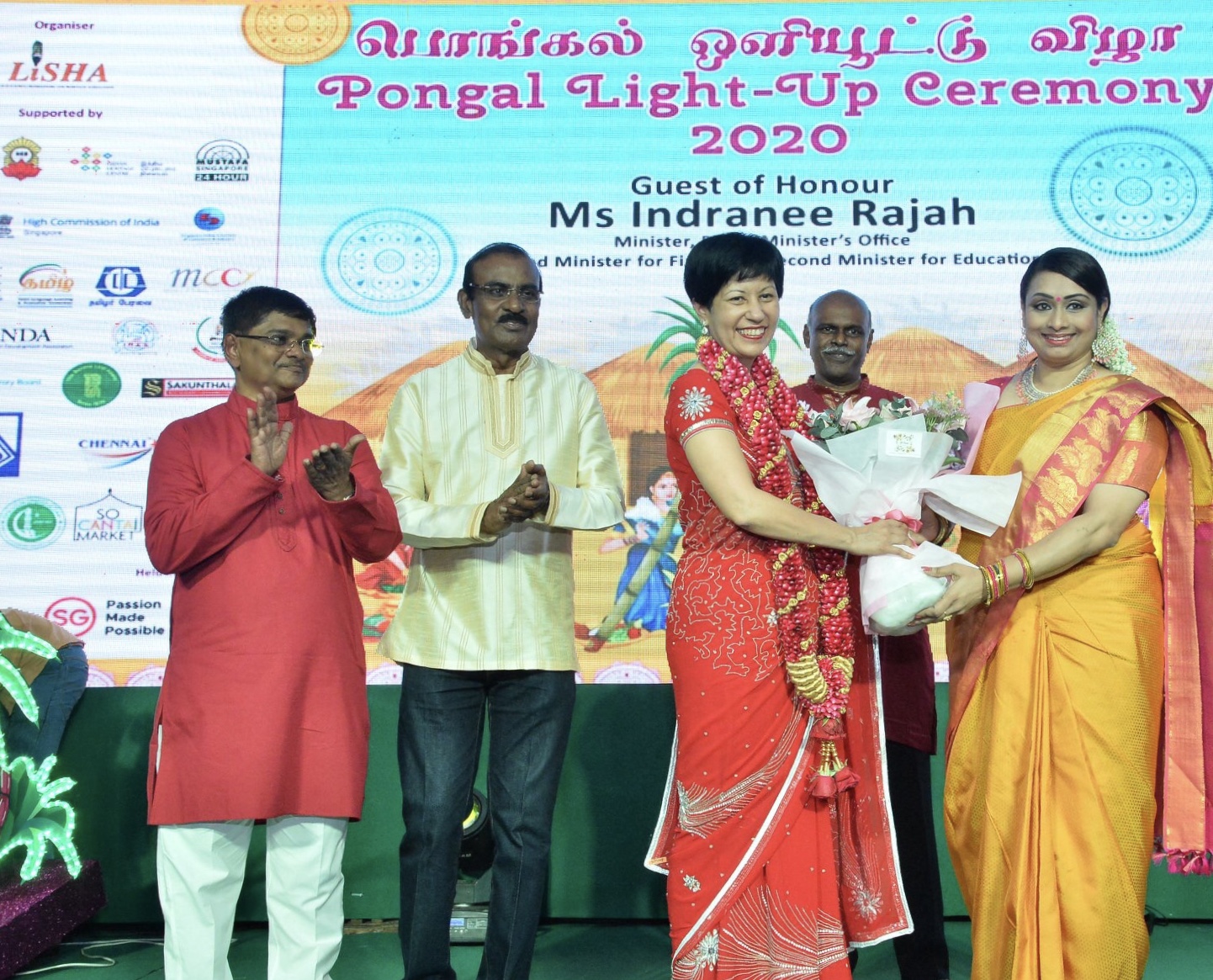 LISHA’s President Raja Kumar Chandra (left) at the Pongal Light Up ceremony with GOH Ms. Indranee Rajah (centre) and Joyce Kingsley who leads LISHA’s ladies wing. 