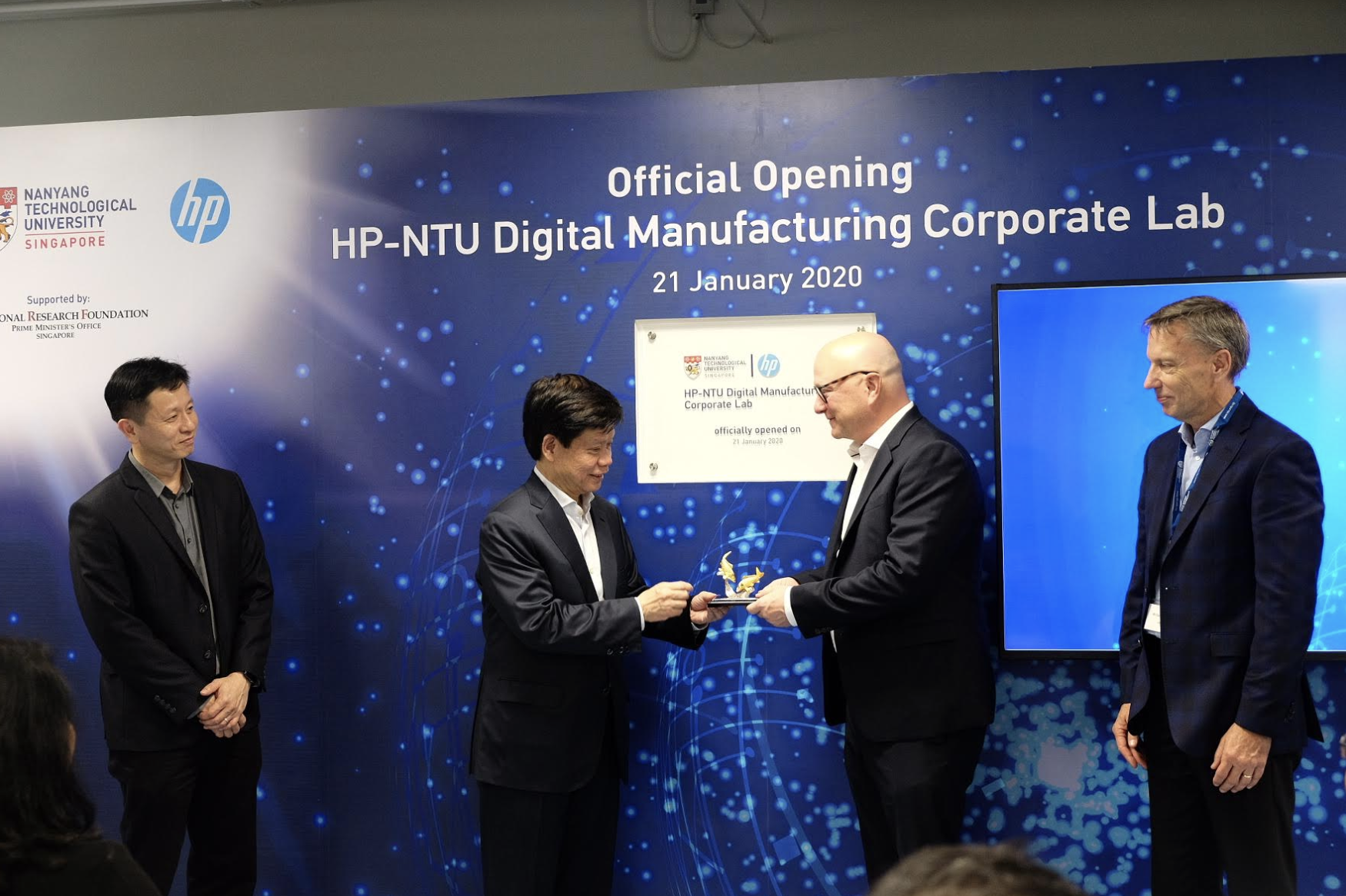 (Left to right) The HP-NTU Corporate Lab was officially opened today by NRF Singapore Executive Director Lim Tuang Liang, NTU Senior Vice President (Research) Prof Lam Khin Yong; HP Inc CTO Shane Wall; HP Inc Chief Technologist, Print, Glen Hopkins. At the opening, Prof Lam also presented token of appreciation to Wall. Photo courtesy: HP