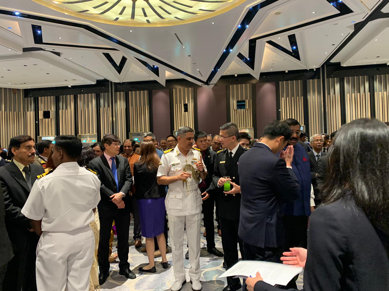 Rear-Admiral Lew Chuen Hong, Chief of Navy of the Republic of Singapore in conversations with senior members of the Republic of India Navy at the reception to celebrate India's 71st Republic Day in Singapore. Photo: Connected to India