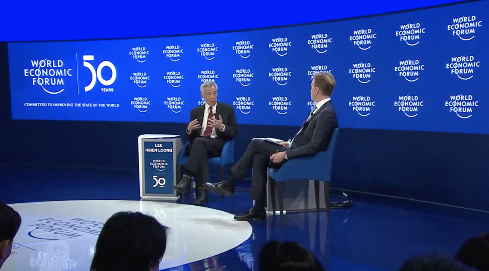 PM Lee Hsien Loong speaking at one of the dialogue sessions at World Economic Forum (WEF). Photo courtesy: Screenshot from WEF video