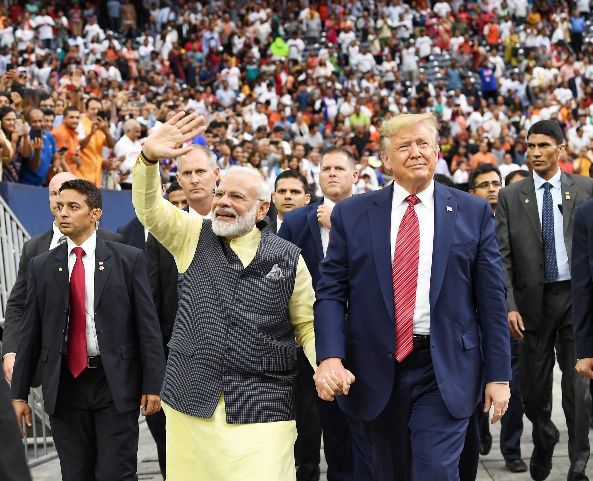 Donald Trump and Narendra Modi greeting the Indian diaspora at the Howdy, Modi event in USA last year. Photo courtesy: Twitter/@narendramodi
