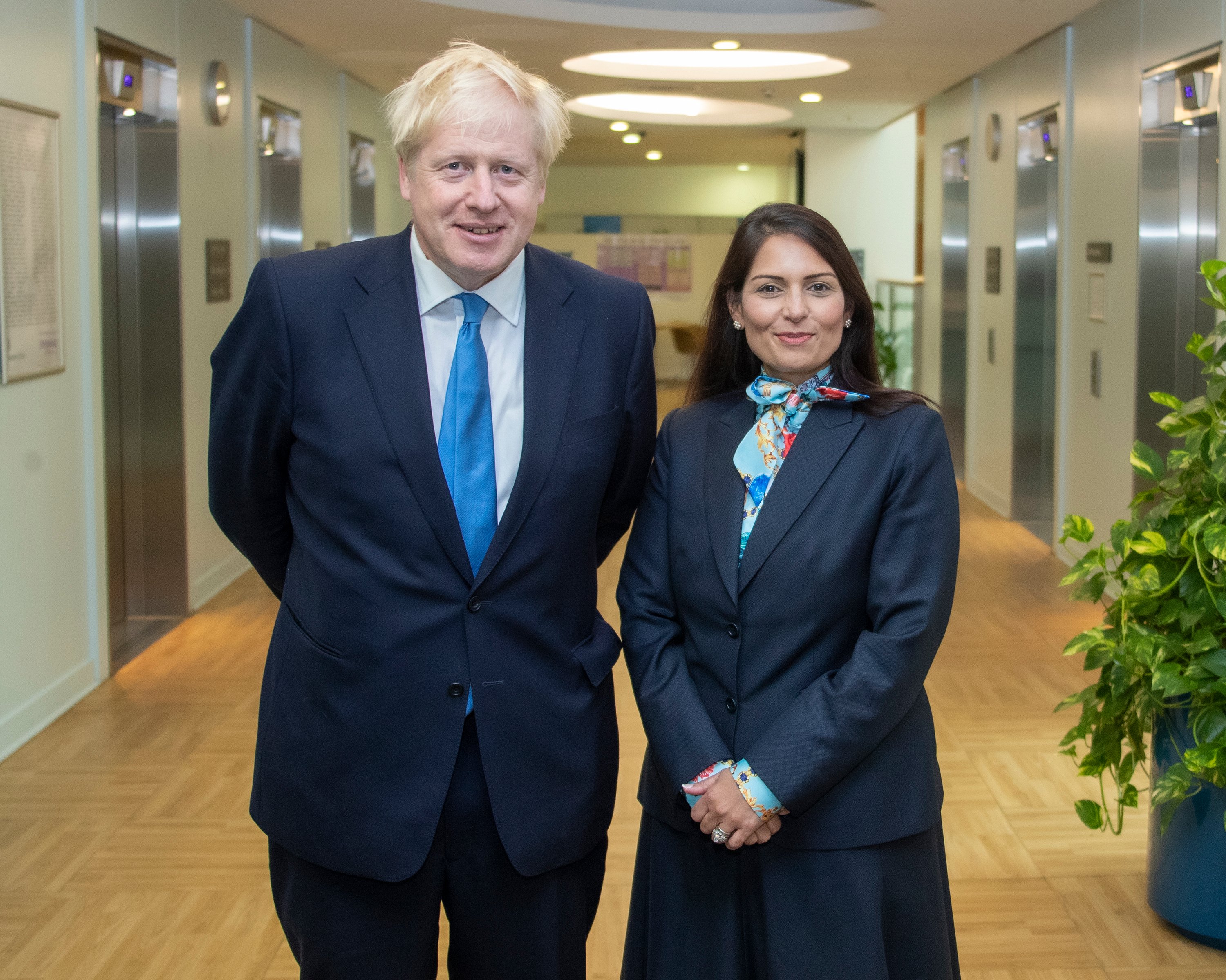 UK Prime Minister Boris Johnson with Indian-origin Home Minister Priti Patel. File photo courtesy: Twitter/@10DowningStreet