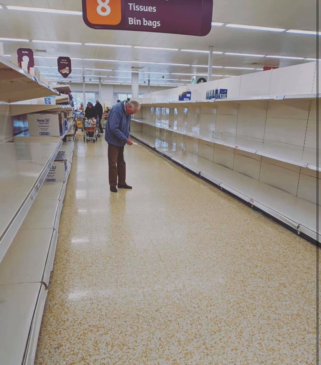 Panic buying in the UK leaves grocery store shelves empty, prompting supermarket chains to impose purchase limits. Photo courtesy: Twitter/@Covid19depot