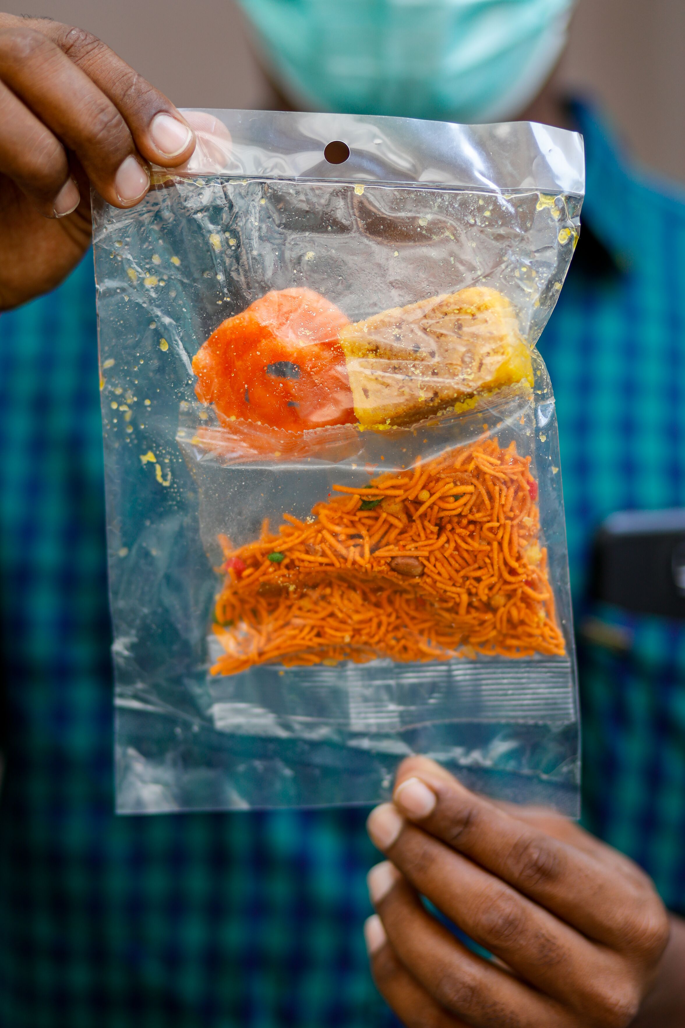 The sweets were distributed to foreign workers across 22 locations, regardless of race. Photo courtesy: Ministry of Manpower (MOM)