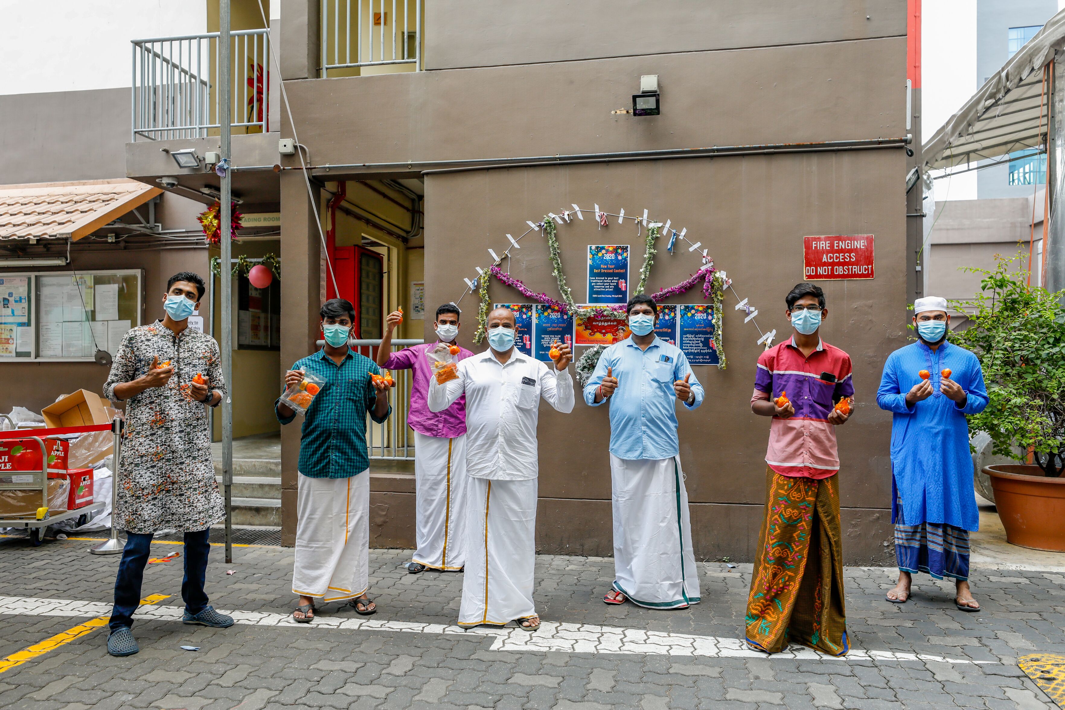 Workers dressed up for Bengali New Year. Photo courtesy: Ministry of Manpower (MOM)