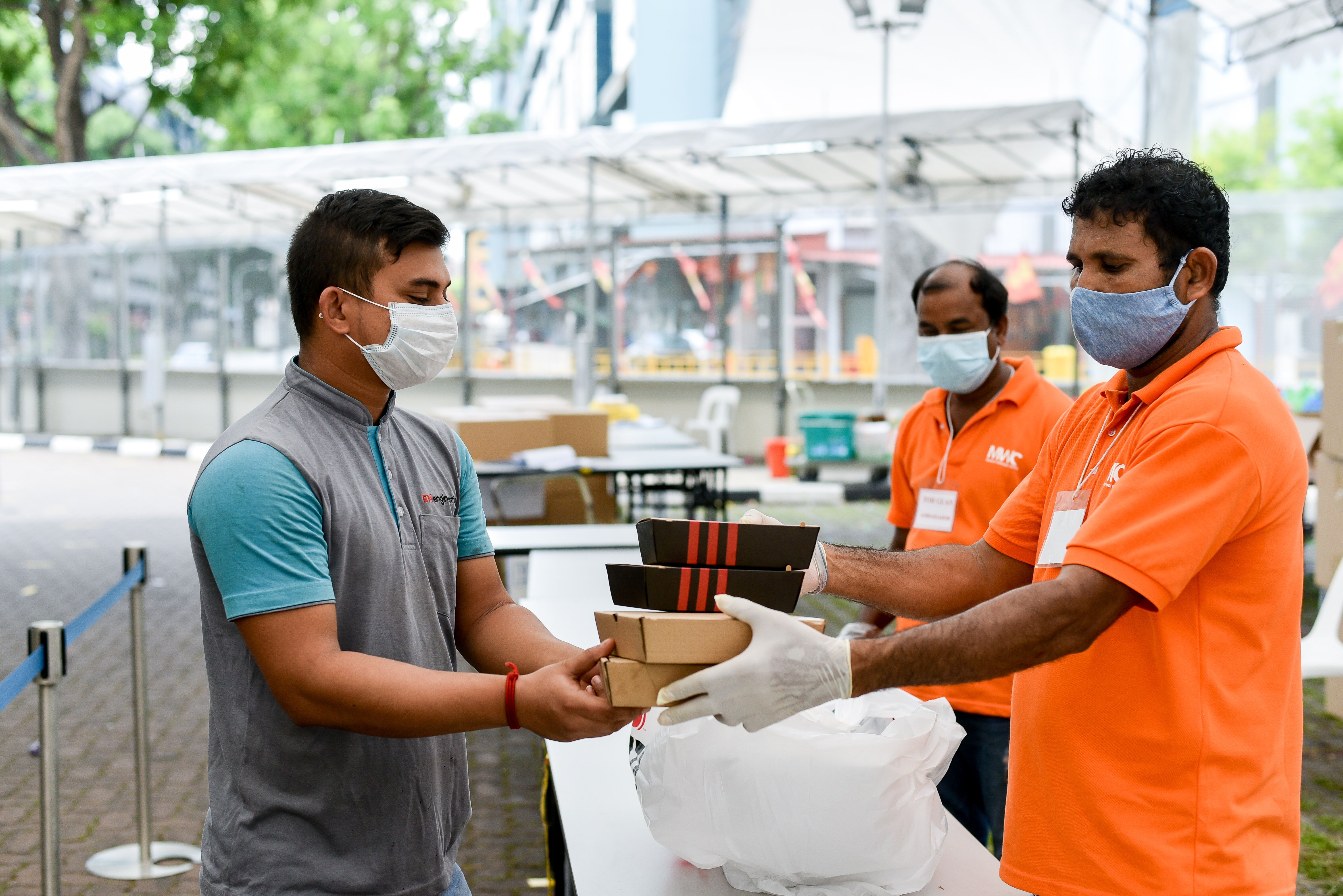 The workers also received fast food treats to celebrate the occasion. Photo courtesy: Ministry of Manpower (MOM)