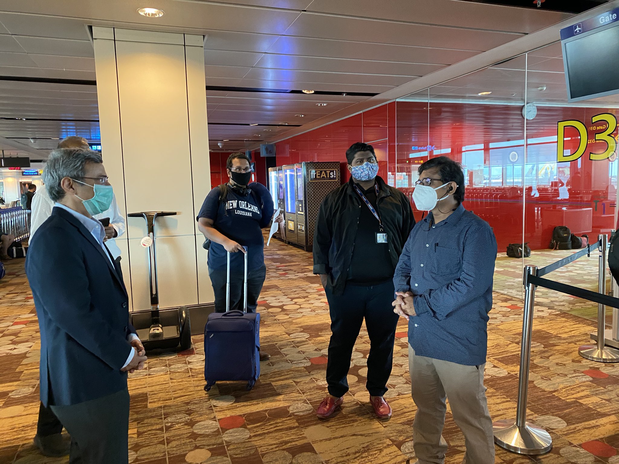 Indian High Commissioner to Singapore Jawed Ashraf interacting with passengers being repatriated to India. Photo courtesy: Twitter/@IndiainSingapor