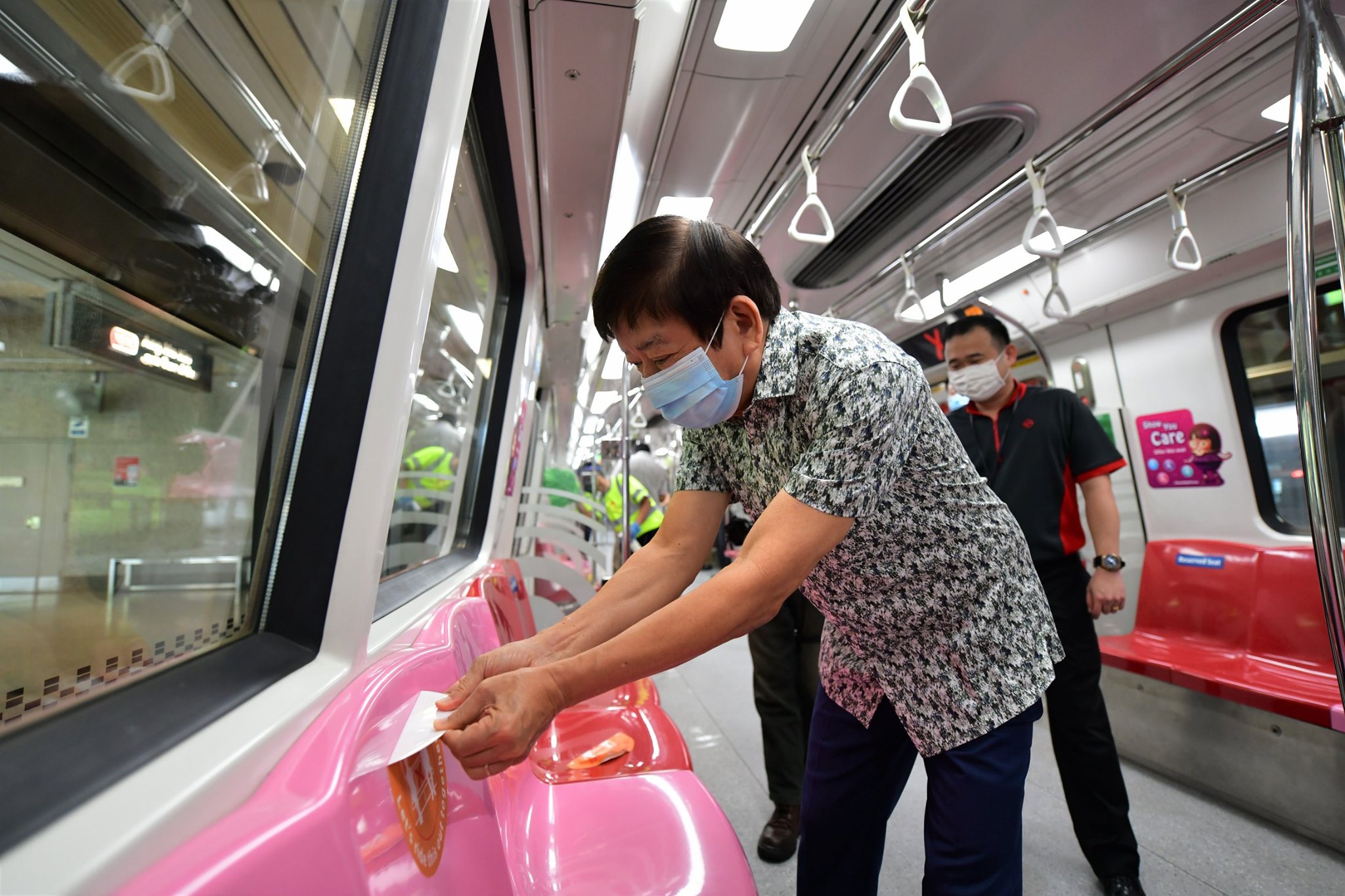 Green and orange stickers reminding commuters to keep their distances are being removed as physical distancing will be difficult once the crowds return. Photo courtesy: Facebook/Khaw Boon Wan