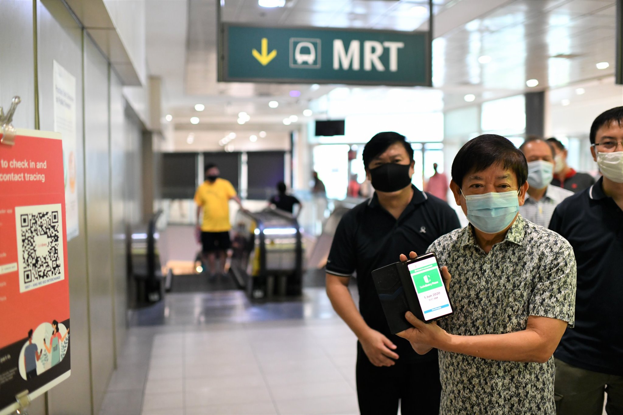 Checking in and out of places using SafeEntry is part of the new normal, said Minister Khaw Boon Wan. Photo courtesy: Facebook: Khaw Boon Wan