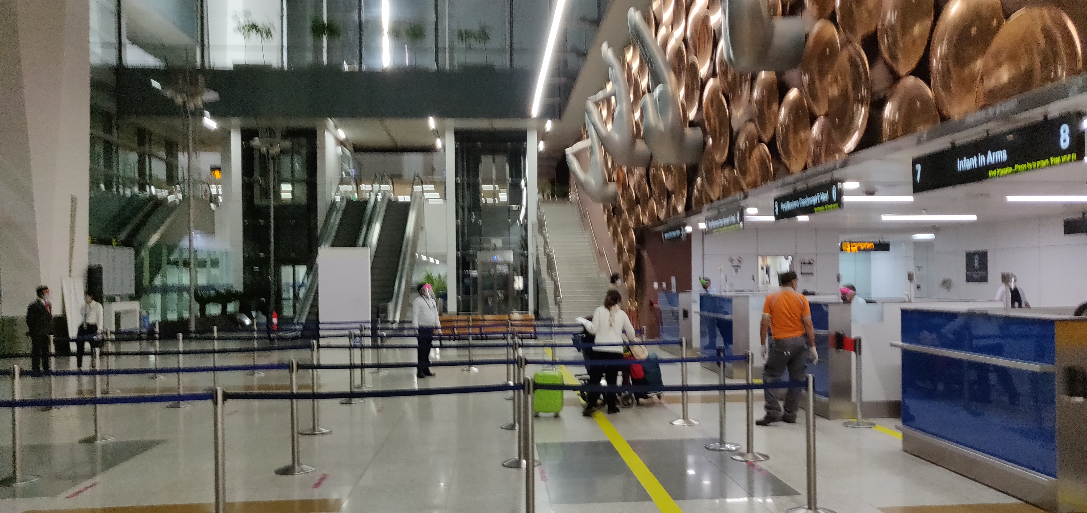 The social distancing protocol at the airport, as well as the deserted immigration area, really drove home the impact of the crisis. 