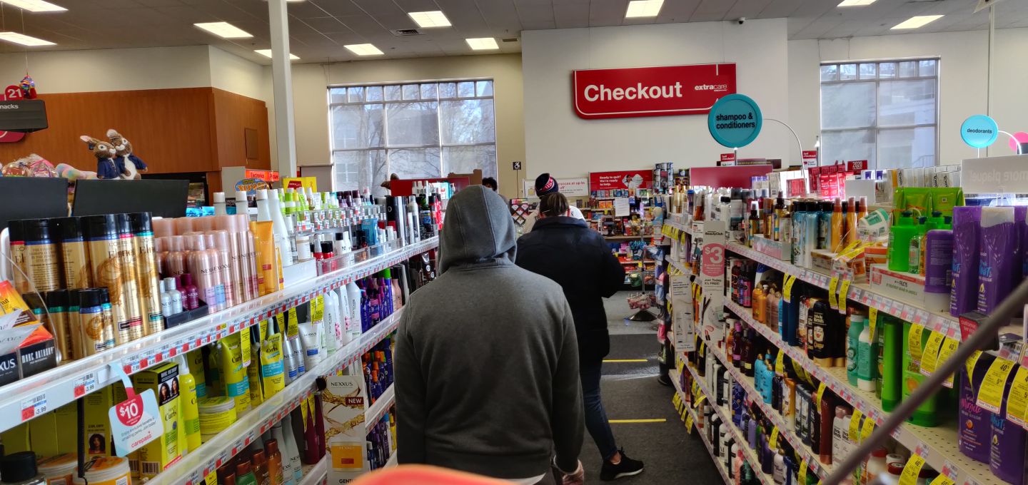Queuing up while maintaining social distancing at a pharmacy. Photo: Connected to India