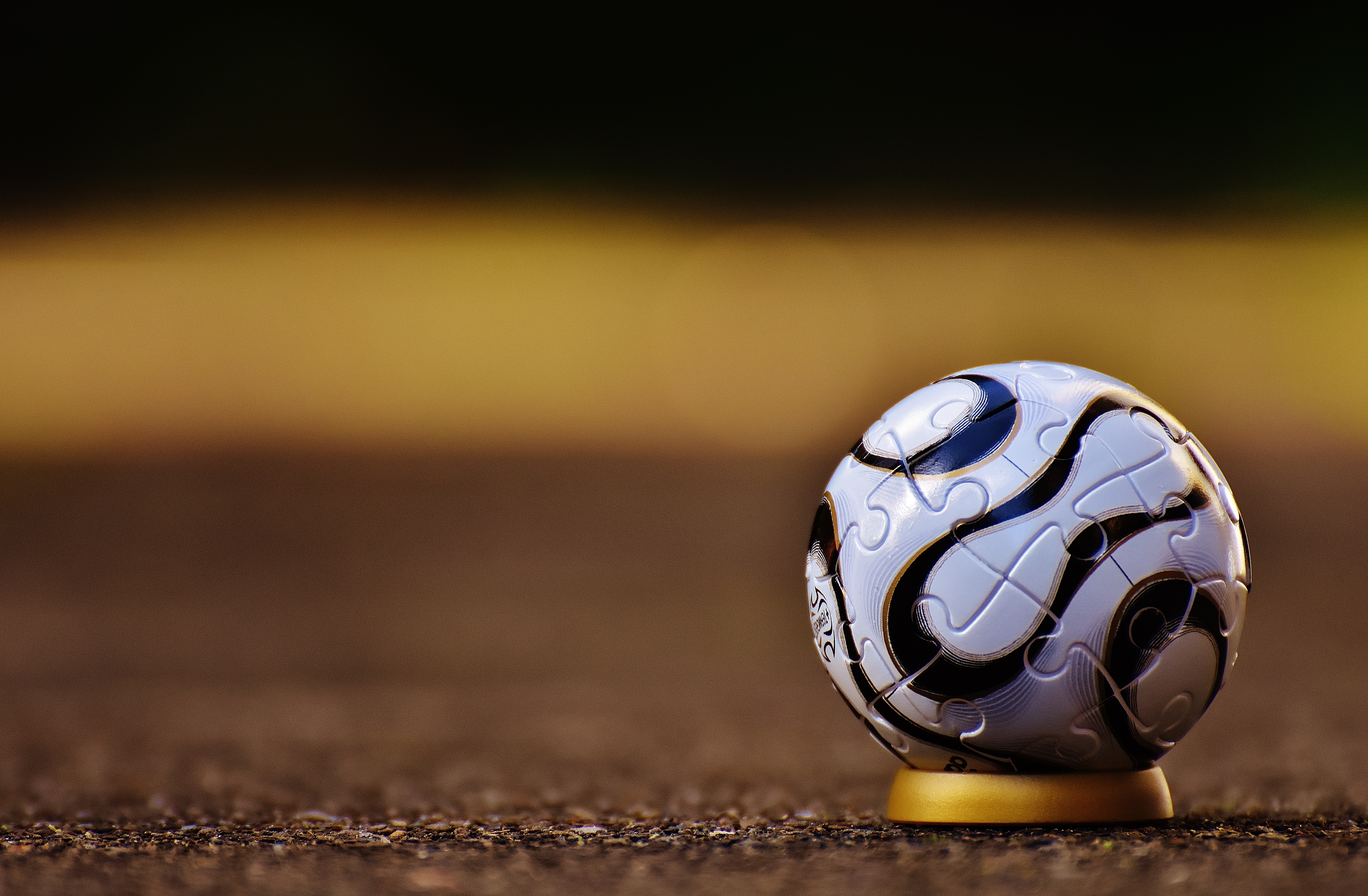 football in a soccer field connectedtoIndia