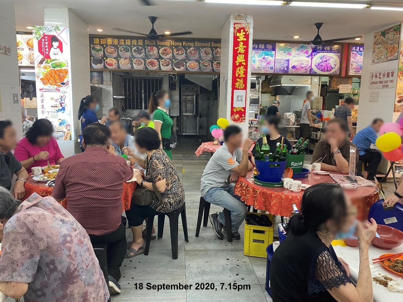 Patrons at two different tables in an F&B outlet in Chinatown were seated less than 1 metre apart. Photo courtesy: Singapore Food Agency