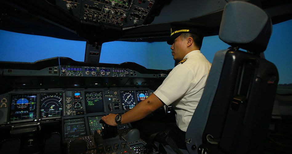 Visitors can try operating a flight simulator! Photo courtesy: SIA