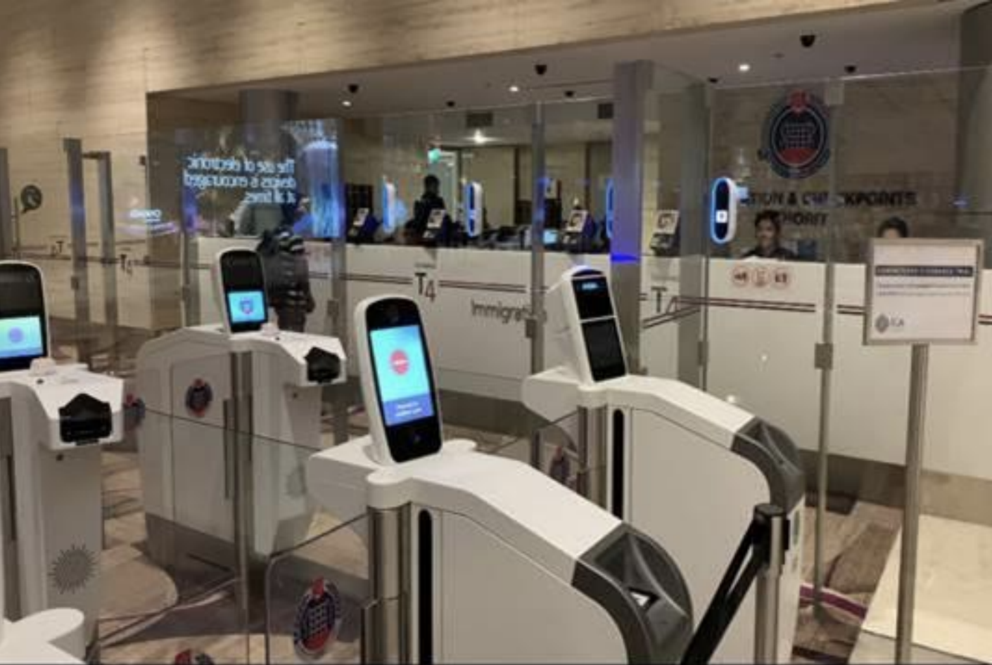 Automated immigration lanes with iris and facial scanning at Changi Airport Terminal 4. Photo courtesy: ICA