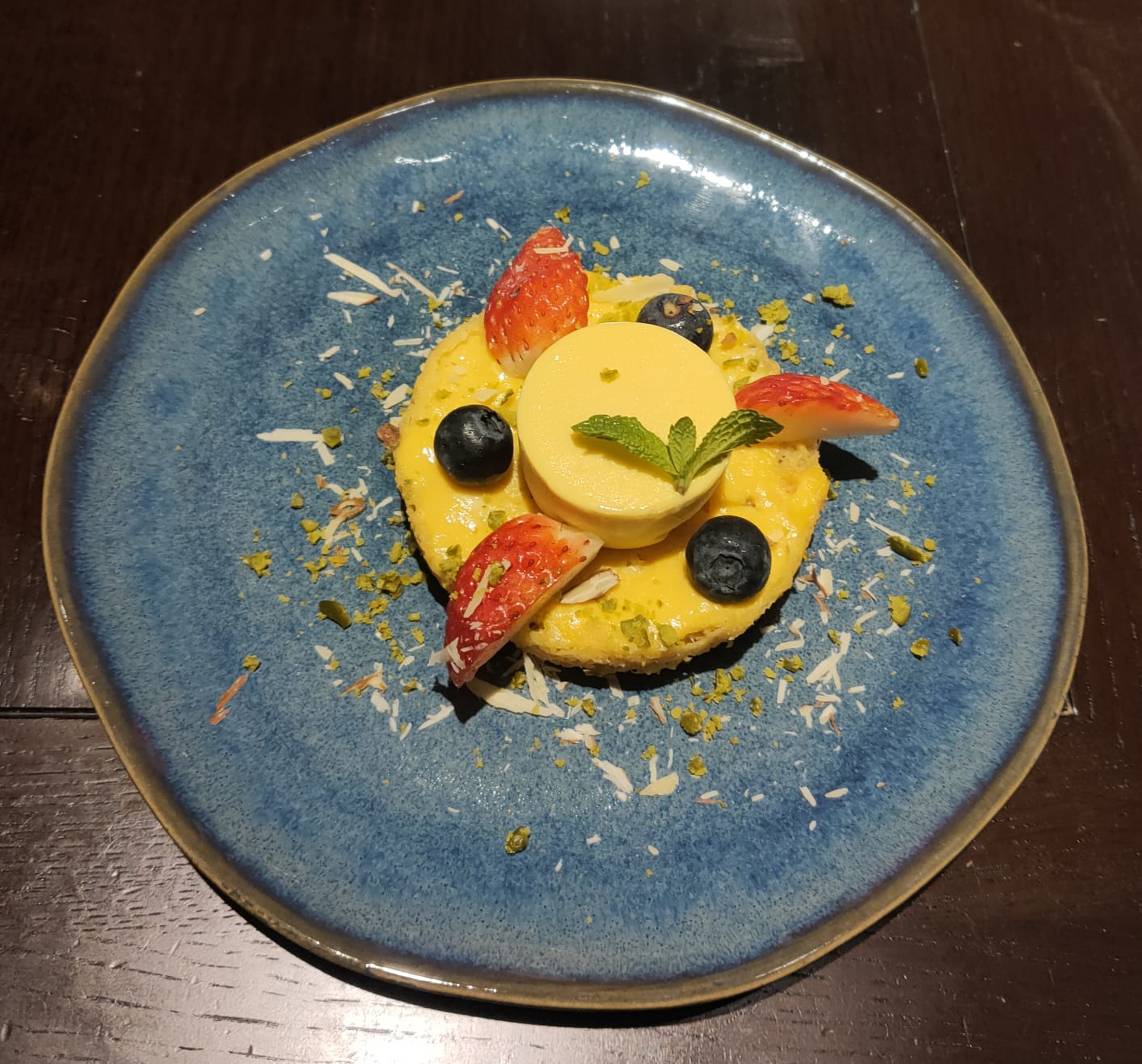 Mango Ghevar, a  traditional Rajasthani sweet cake with fresh mango and Mango Kulfi. Photo credit : Connected to India 