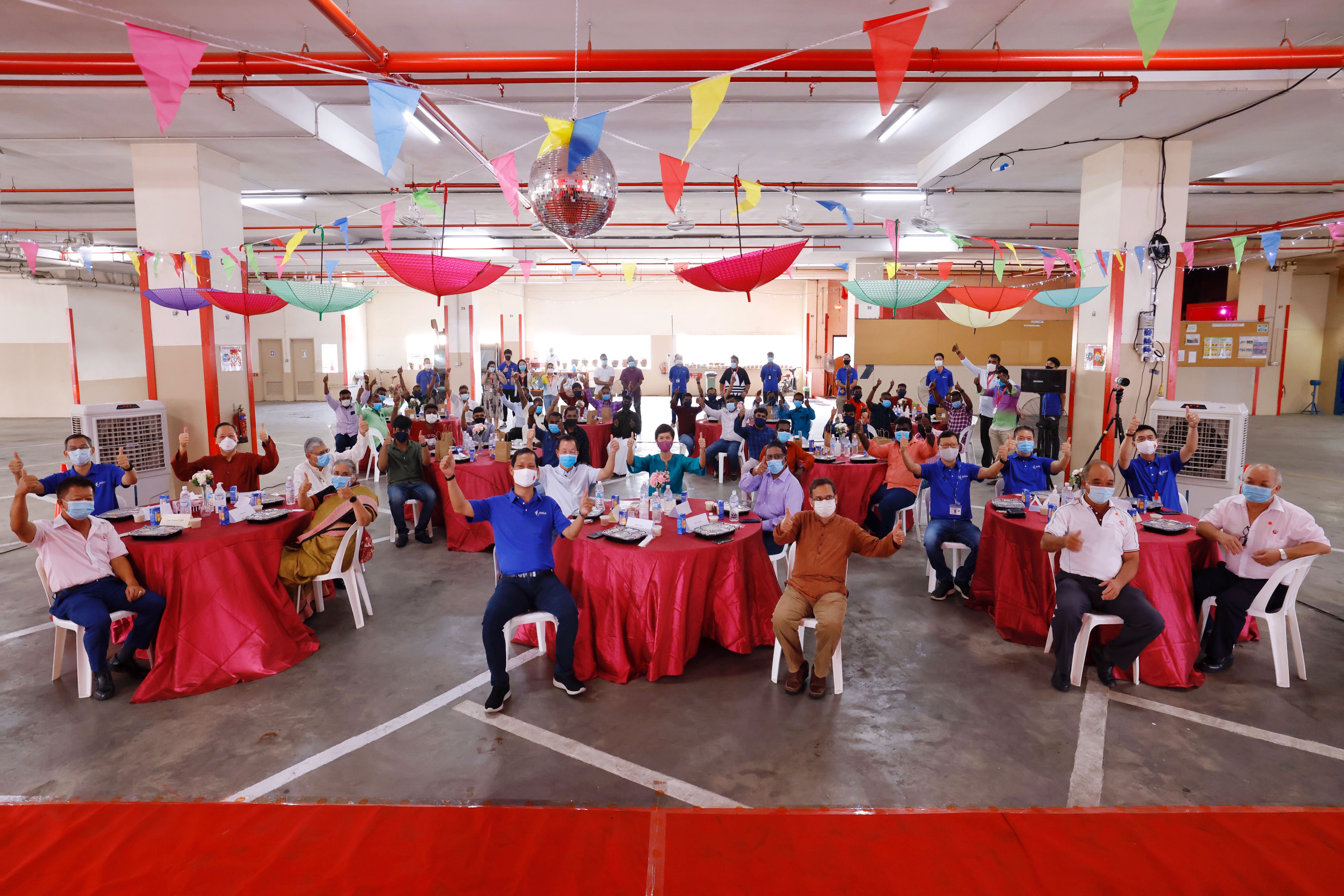 MOM celebrates Deepavali with migrant workers. Photo courtesy: MOM