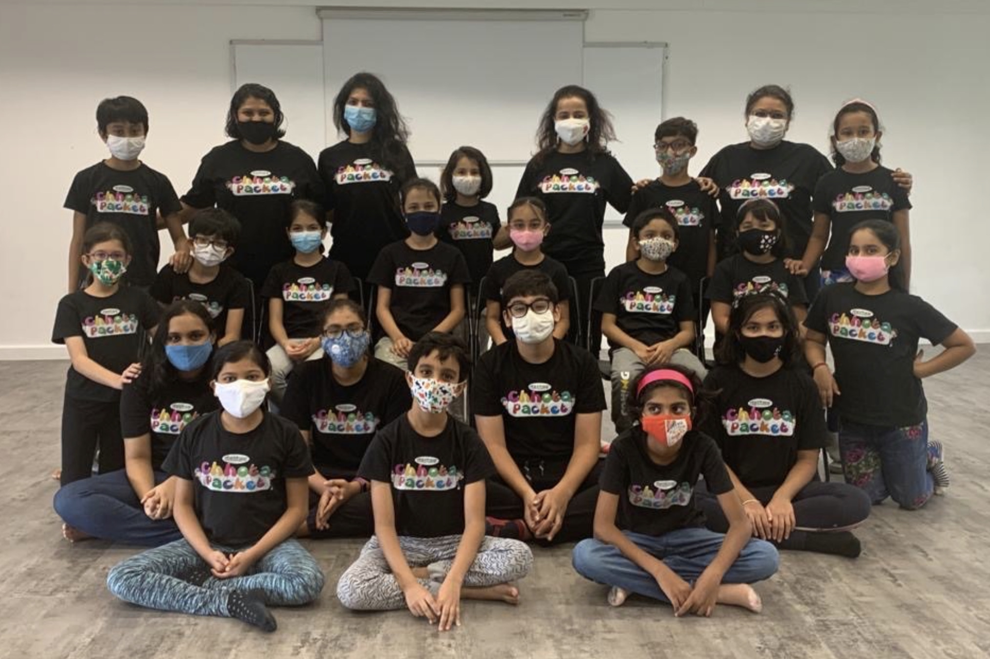 The title Earthward Ho’ was suggested by one of the twenty children who attended Dastak's workshop with Shalaka Ranadive (centre top row). Photo Courtesy: Dastak 