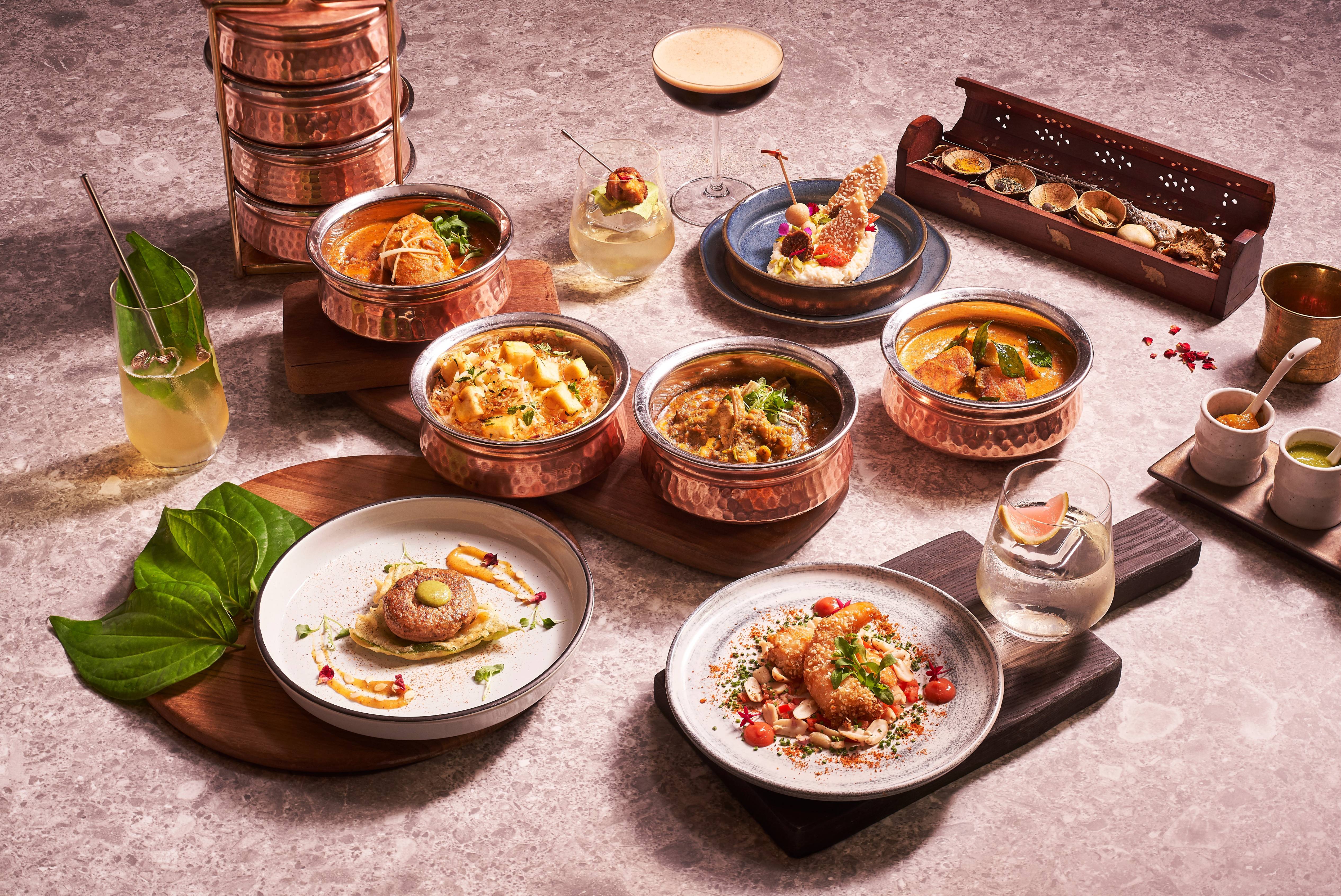 The main course is a selection of familiar Tiffin Room dishes served in their signature tiffin containers