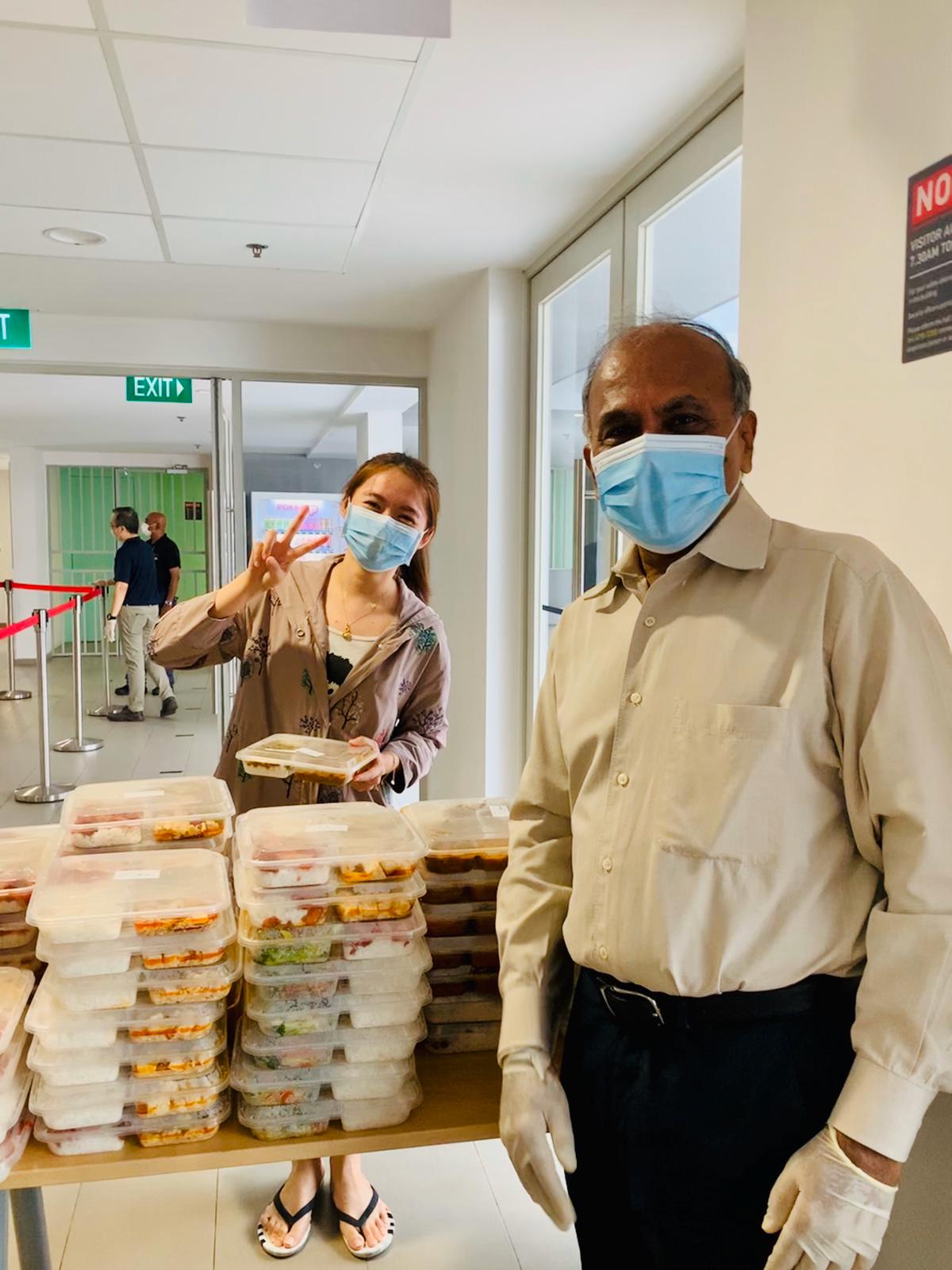 Prof Subra Suresh, NTU president, giving out food packs to students residing on campus during Singapore’s circuit breaker period from April to June 2020. Photo courtesy: NTU