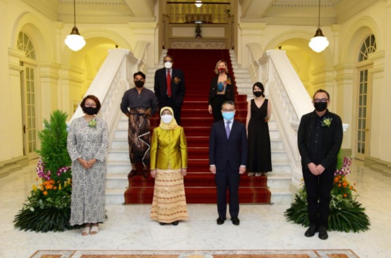 The 2020 Cultural Medallion and Young Artist Award recipients with President Halimah Yacob (centre left) and Minister for Culture, Community and Youth (MCCY) & Second Minister for Law, Edwin Tong (centre right). Pallippakkam Sivaraman Somasekharan receiving the award on behalf of Sushma Soma, and Imelda Said receiving the award on behalf of the late Sarkasi Said. Photo courrtesy: NAC