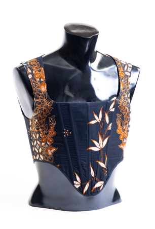This one-of-a-kind corset piece is handmade by Putri Adif using a batik fabric printed with floral motifs. For Adif, the body conforming quality of the historical garment serves as an empowering tool that amplifies the wearer’s confidence.
