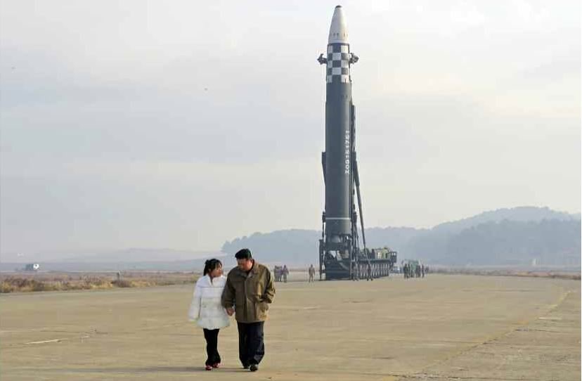 Several photos were published by North Korea's state news agency KCNA, showing the two holding hands while they chat, speaking with officials, inspecting missiles and watching the launch from a viewing deck.