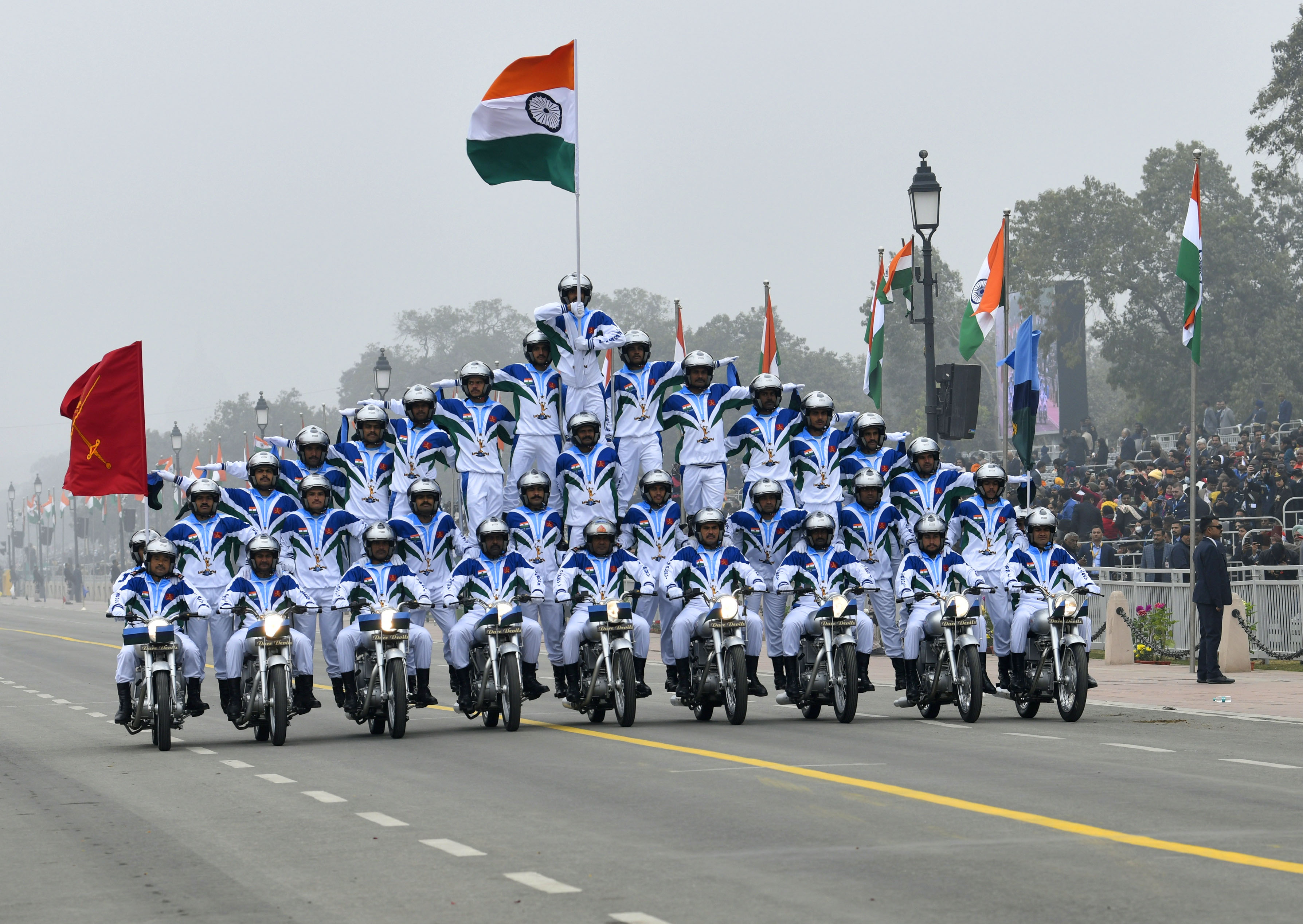 Several thousand people, braving the cold on a foggy morning in New Delhi, watched the parade from their seats around Kartavya Path – or path of duty – while millions more watched on television.