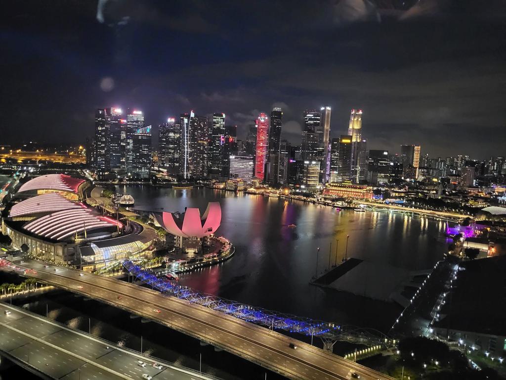 Beautiful night view of the Singapore CBD and the ArtScience Museum from the Singapore Flyer Photo: Connected to India