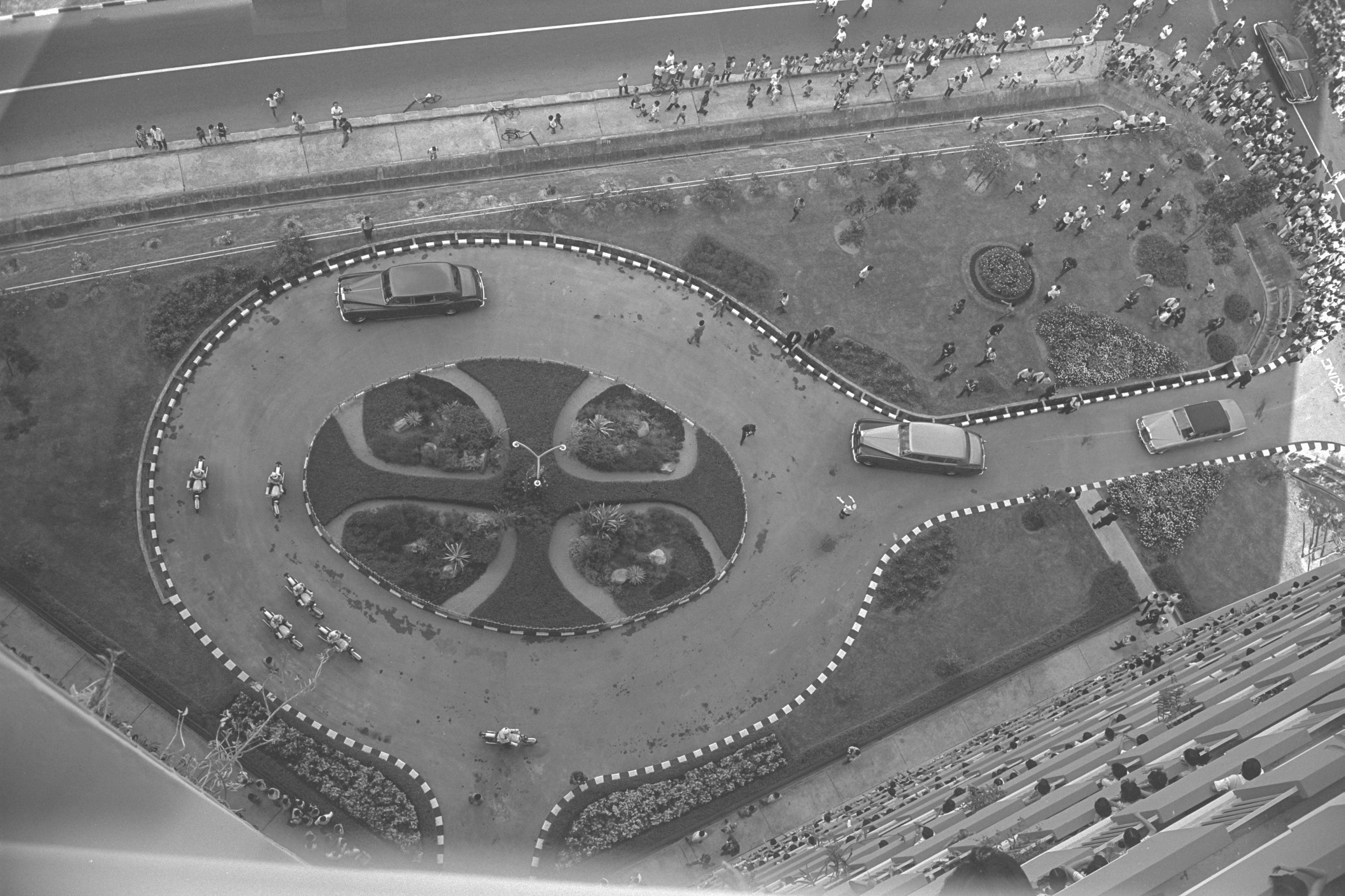 Motorcade of Queen Elizabeth II at the VIP arrival driveway of Block 53, 1972 Ministry of Information and the Arts Collection.