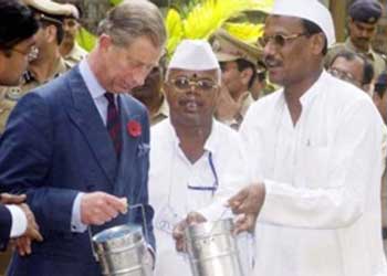 had a 20-minute meeting with dabbawalas in Mumbai at Churchgate railway station in South Mumbai, and his ongoing friendship with them was evident at his coronation.