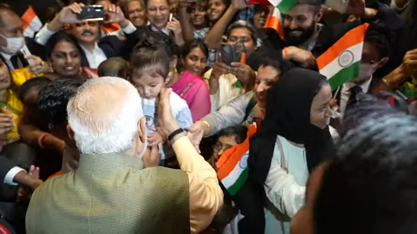 The video shows him interacting with massive crowds of Indians in HiroshimaThe video shows him interacting with massive crowds of Indians in Hiroshima