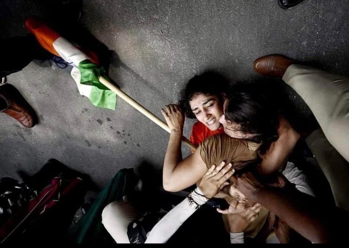 visuals of champions Vinesh Phogat and her cousin Sangeeta Phogat being pinned onto the ground by the police had evoked shock and outrage across the country. 