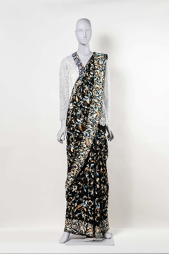 Stylemart, Kavita Thulasidas, Eternal Weaves Collection, his ensemble comprises a kebaya made of white floral lace accentuated with two panels of blue and gold beads; and a gara featuring intricate silk thread handiwork inspired by traditional Parsi embroidery, with flora and fauna that symbolise purity and protection.