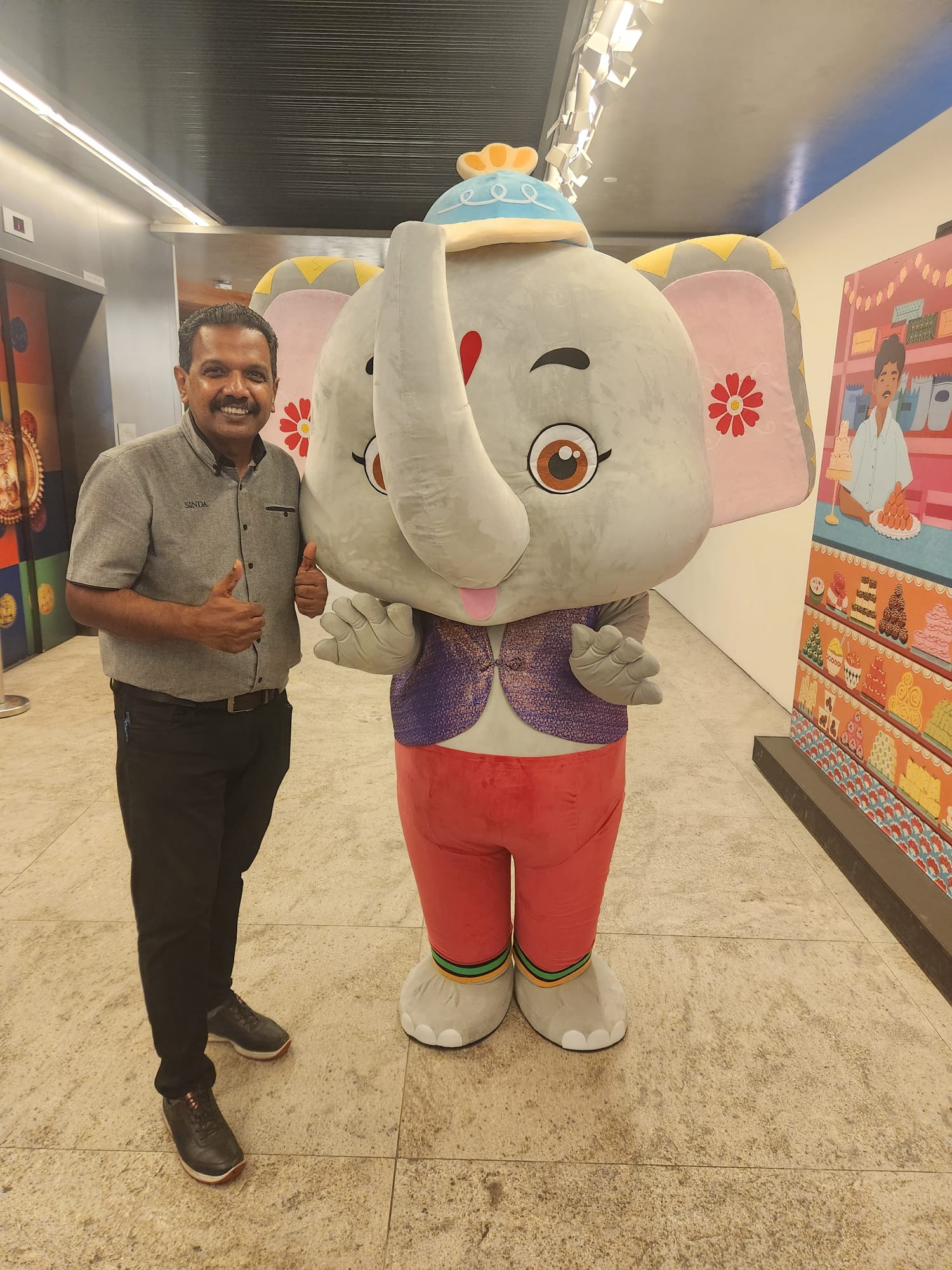 CEO SINDA with LISHA Mascot Tekka Raja Photo courtesy: SINDA