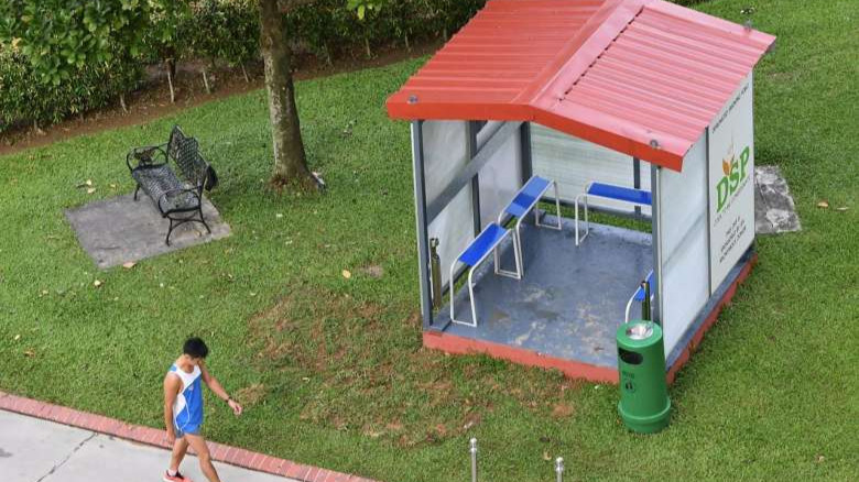 Singaporeans give thumbs up to designated smoking points