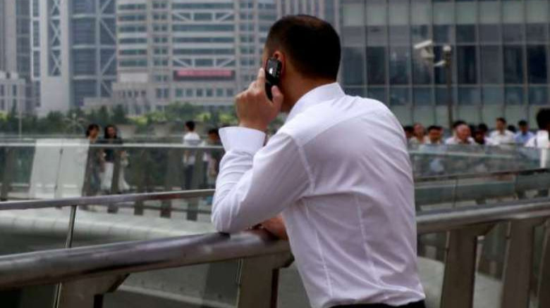 Alert sounded in Singapore over phone scam using police hotline number