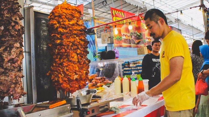 22 unregistered food handlers and illegal workers arrested at Geylang Serai Bazaar