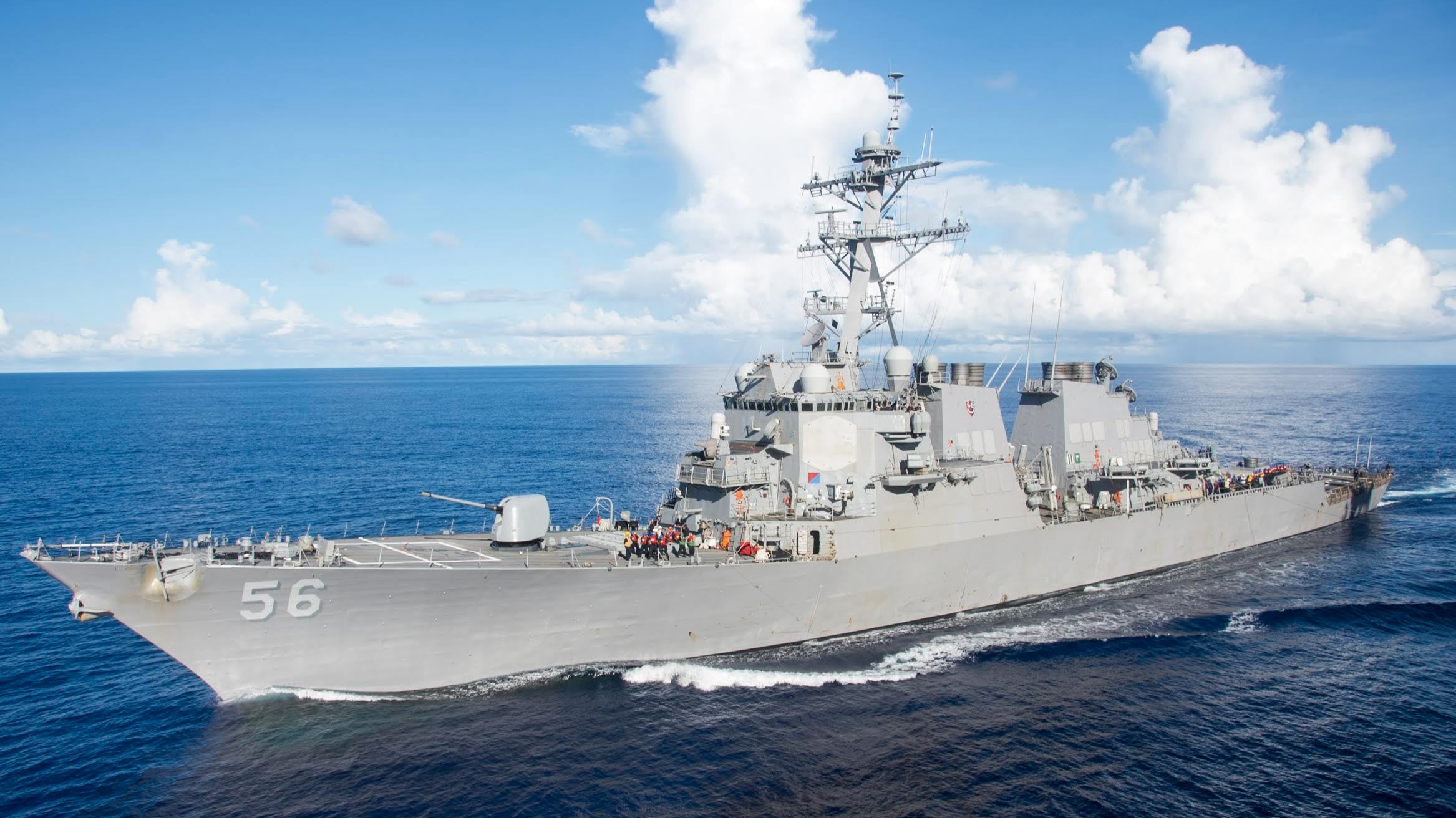 Search underway for 10 missing navy sailors as US warship collides with merchant vessel near Singapore Strait