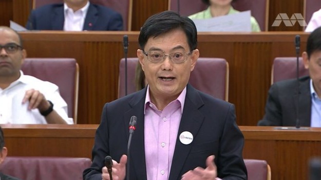 Singapore ministers including the President take a voluntary pay cut while rewarding frontline workers with bonus
