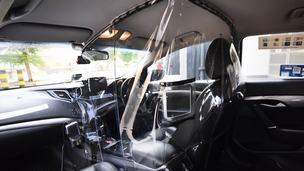 ComfortDelgro taxis fitted with plastic shields to protect drivers