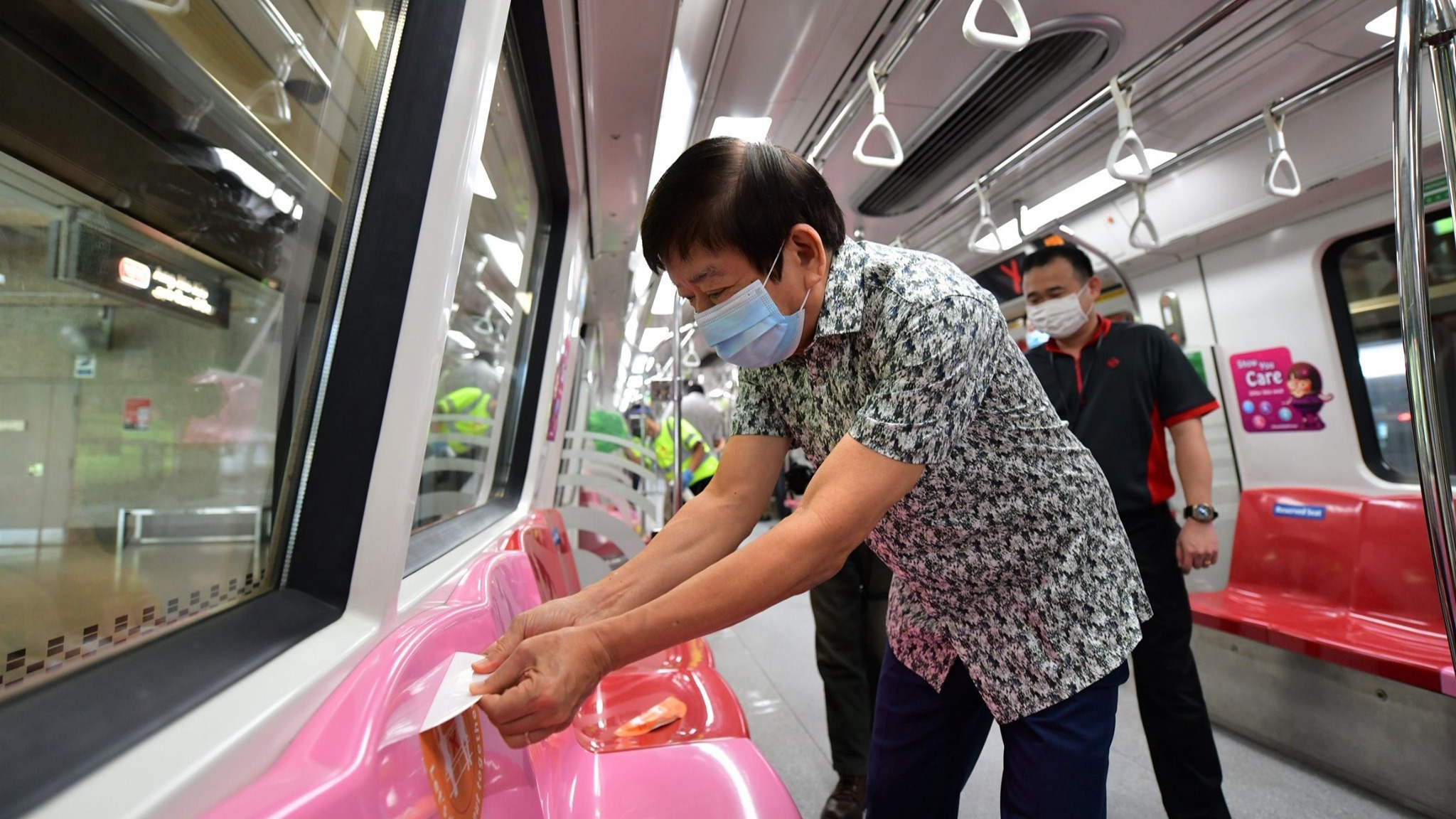 Physical distancing stickers on public transport removed, commuters to mask up