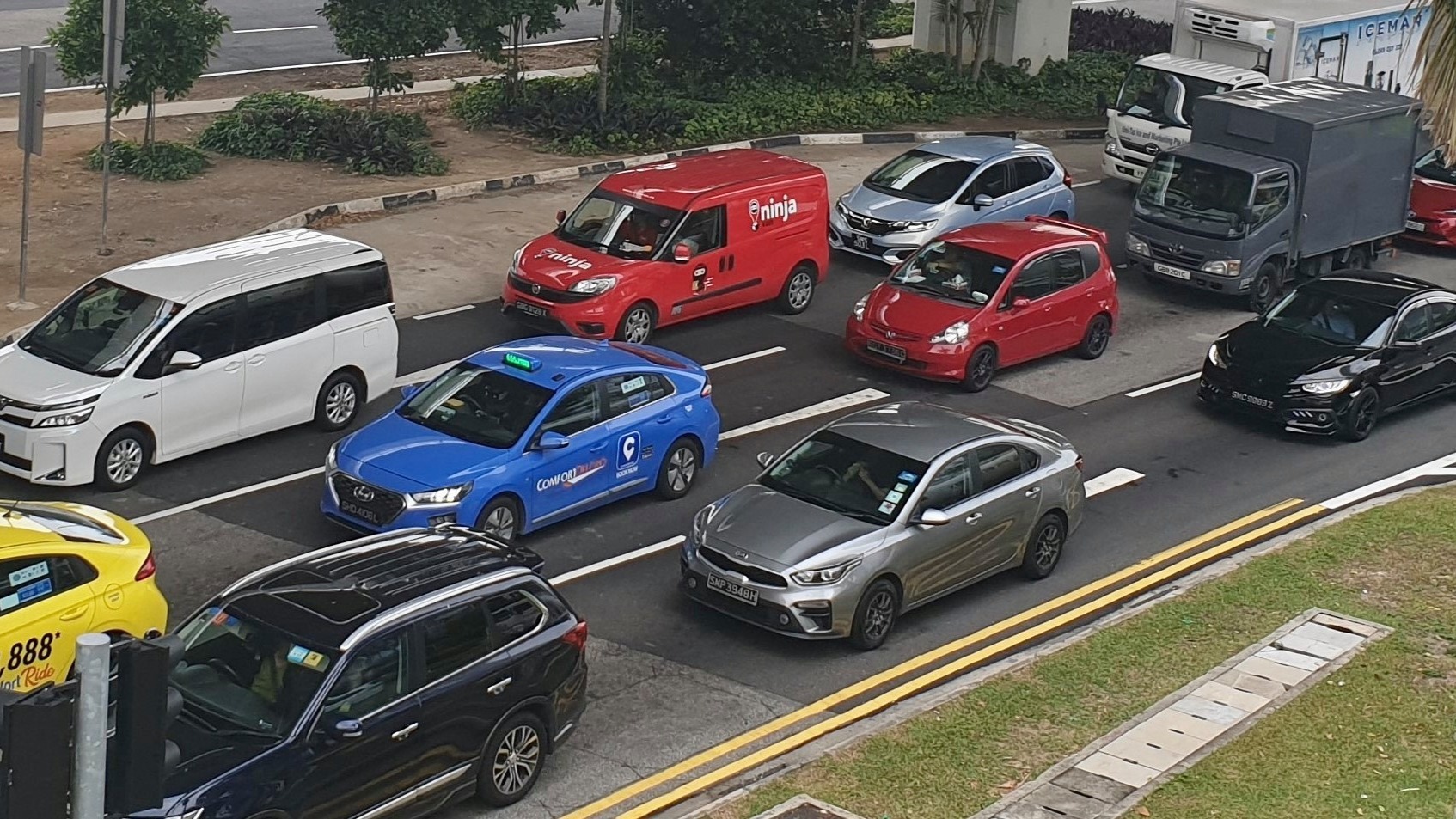 LTA announces new SGD112 million package to help taxi and private hire drivers
